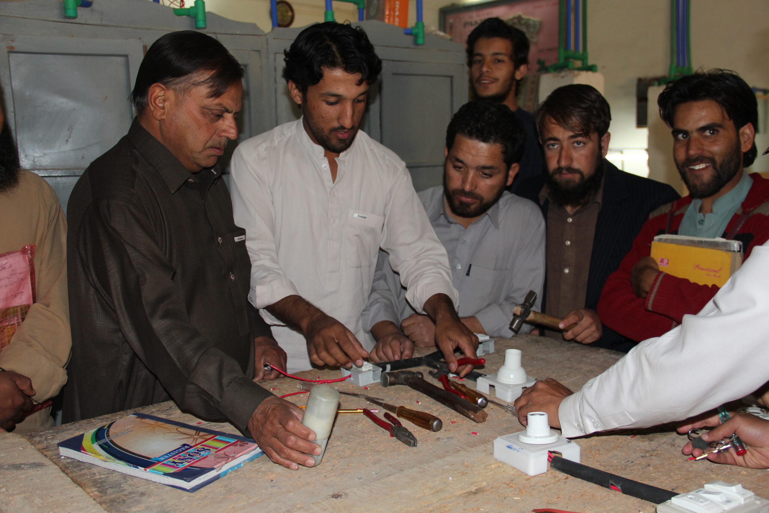 Students learning electrical trade at GTMS Quetta